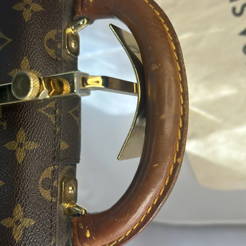 Louis Vuitton Serviette Conseiller Monogram Brown